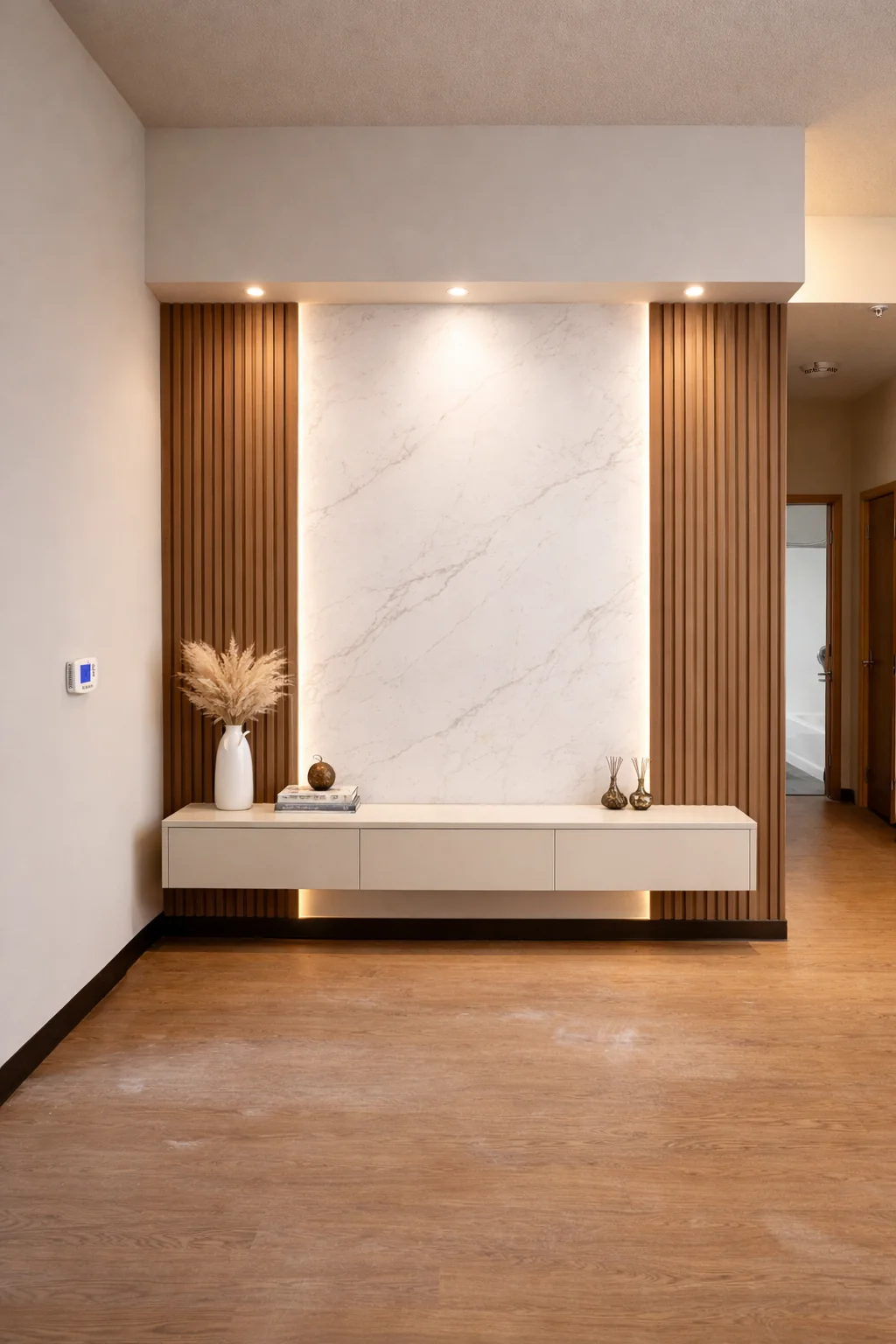 Brown fluted wall panels surrounding a marble media wall